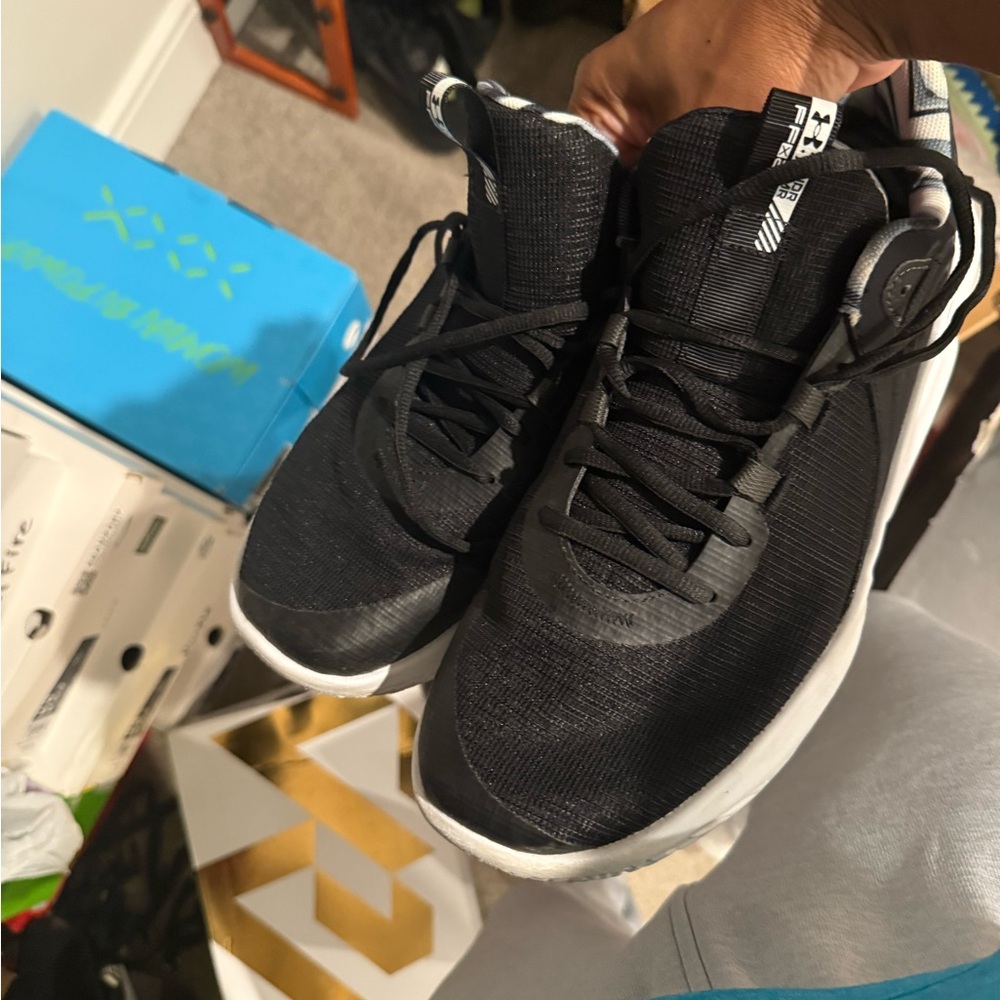 Under Armour Men's Black Athletic Shoes with White Soles